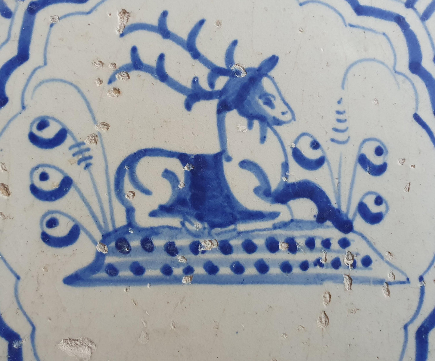 17th Antique Dutch Delft Blue Tile - deer with a meander shape - Dated around 1640