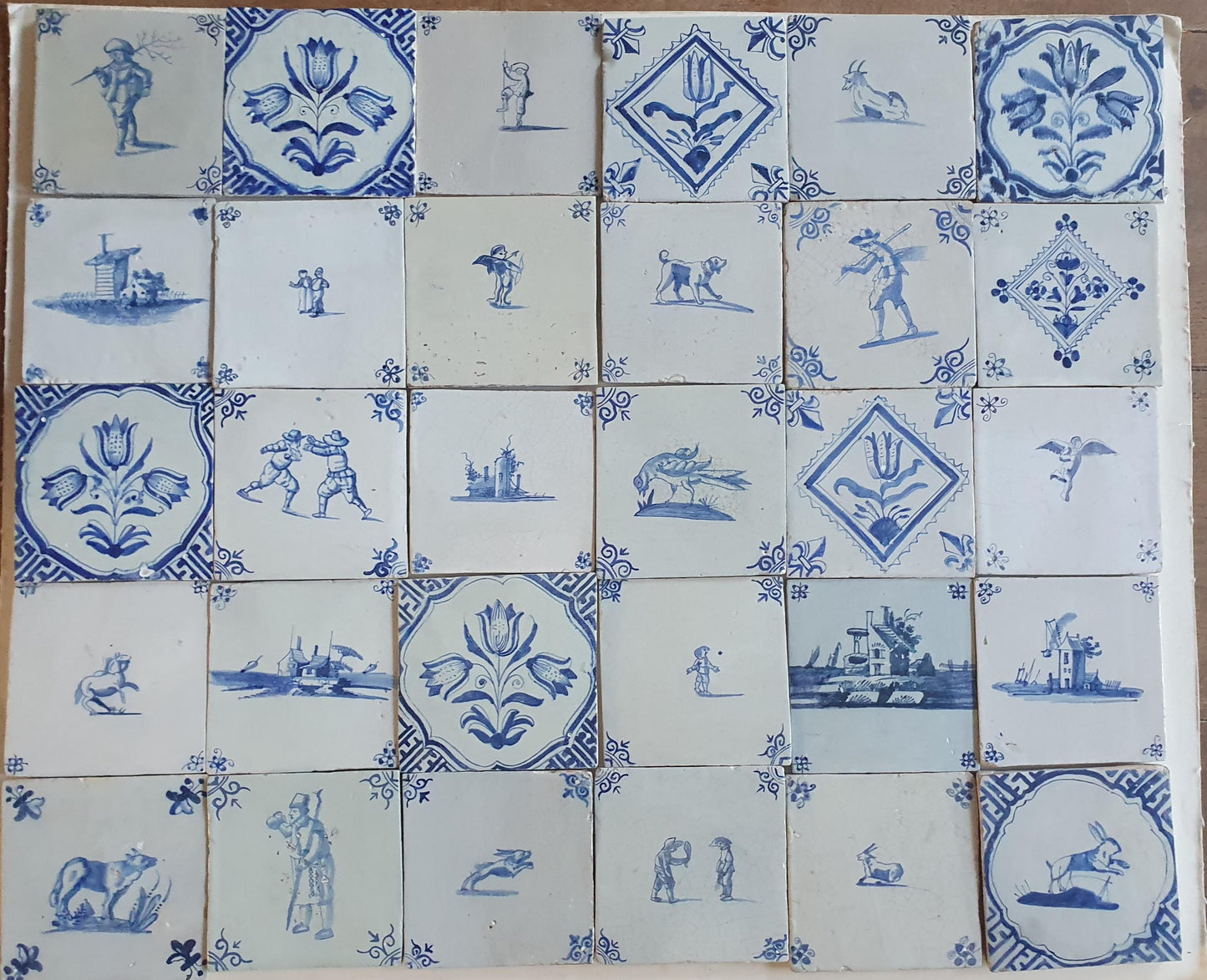 17th/18th Delft tiles, a mix of antique tiles, set of 30