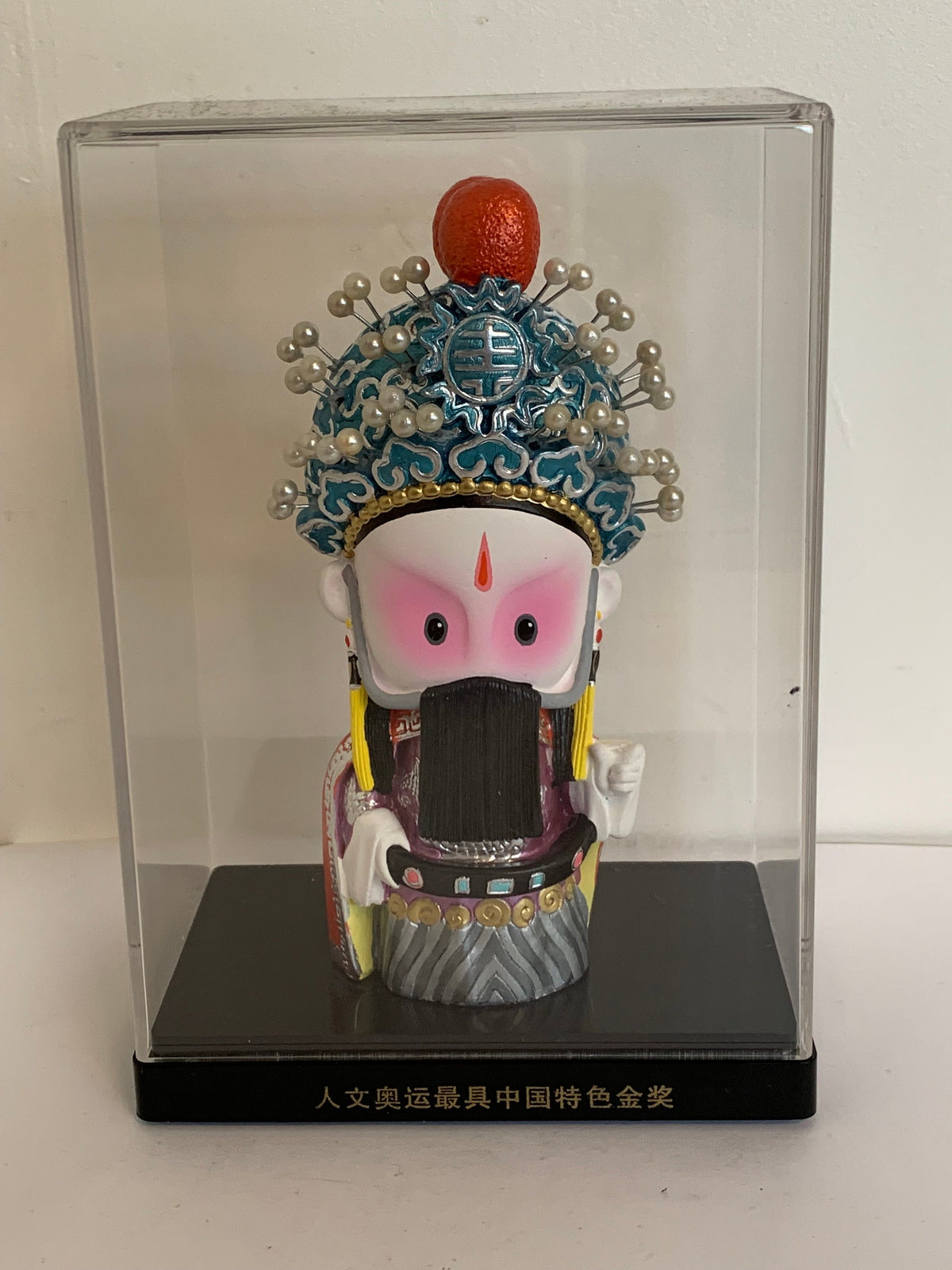 Vintage Chinese Opera pop in vitrine