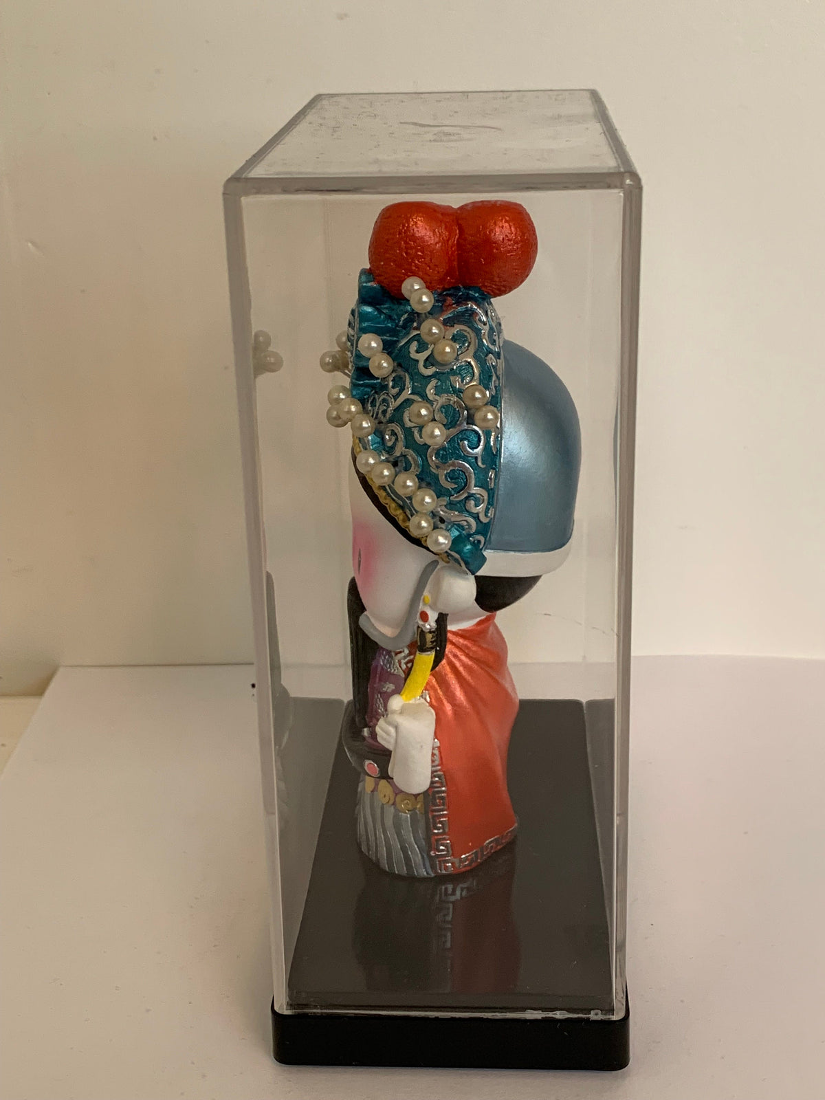 Vintage Chinese Opera pop in vitrine