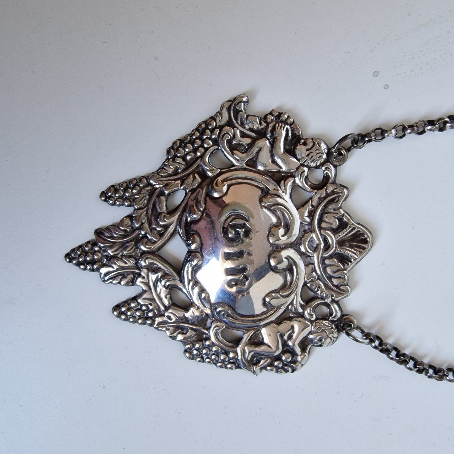 Antique Tested Silver Gin Decanter Label, Angels & Grapes Design