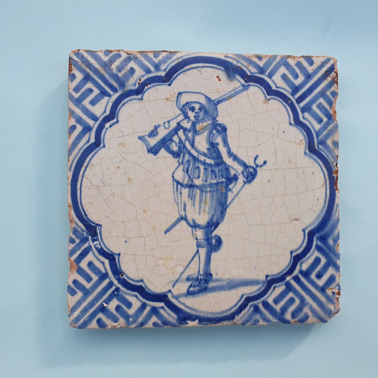 Antique Delft Blue Tile, Dutch Soldier, Wan-li Meander, ca 1625
