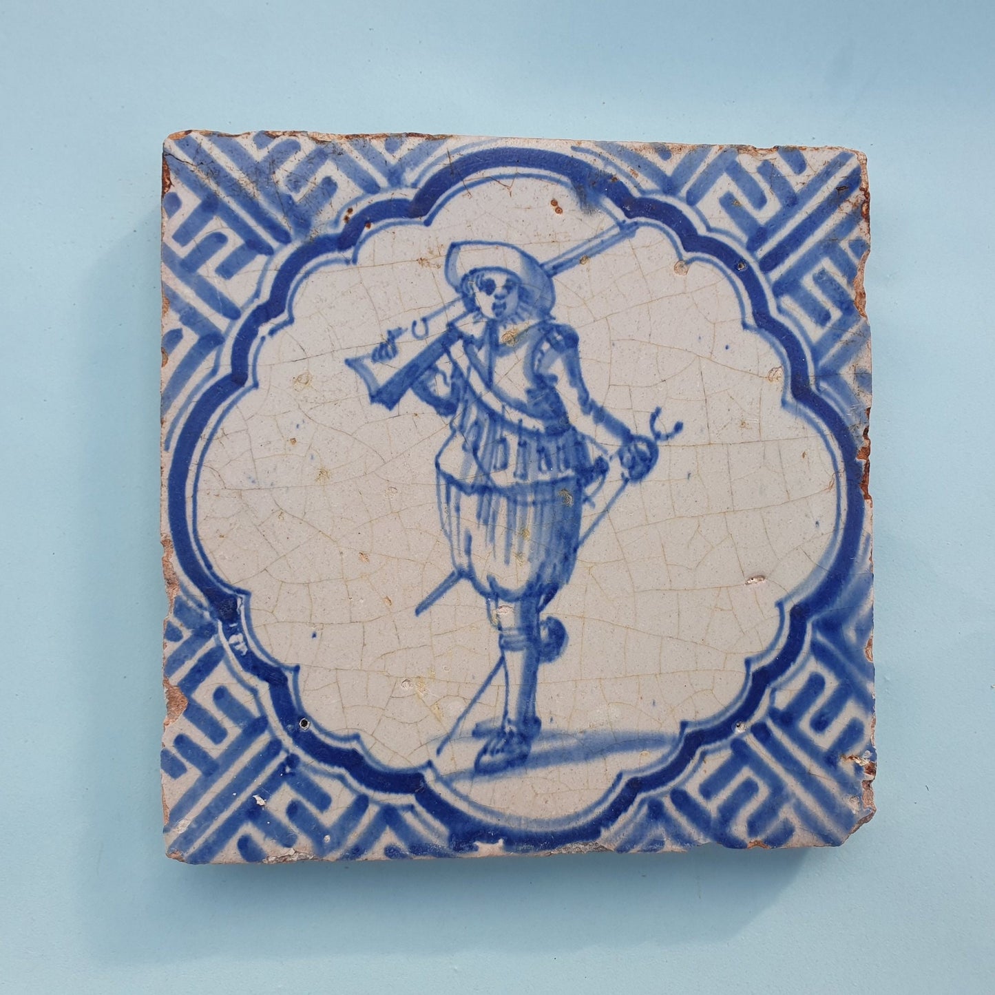 Antique Delft Blue Tile, Dutch Soldier, Wan-li Meander, ca 1625