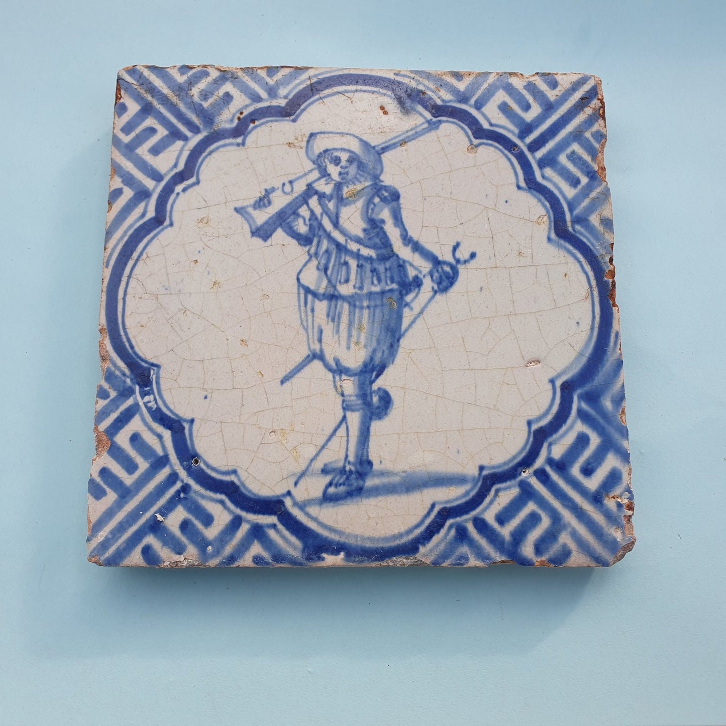 Antique Delft Blue Tile, Dutch Soldier, Wan-li Meander, ca 1625