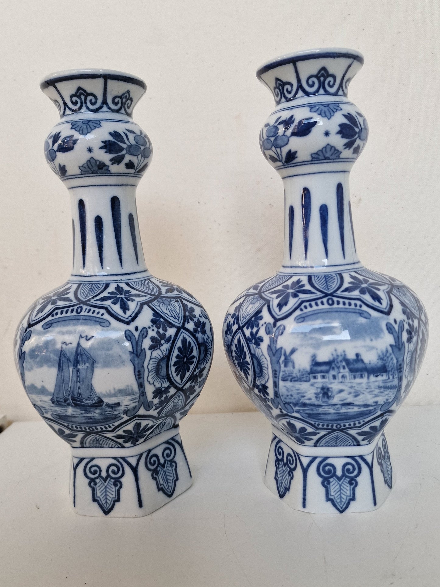 A pair of large Delft antique 'knobbel' vases dutch pottery, 25 cm numbered marked delft made Maastricht 1920-1930 blue ship landscape tiles