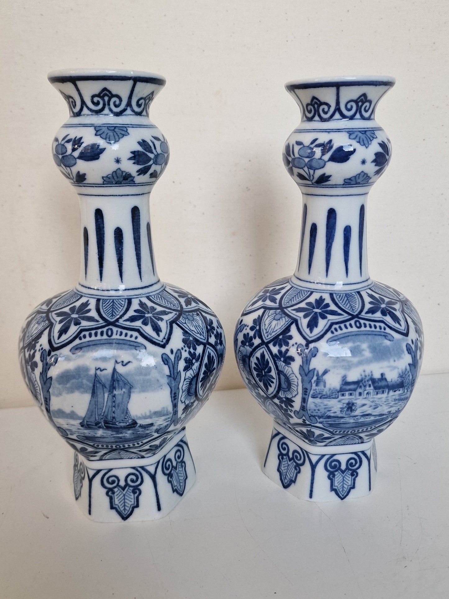 A pair of large Delft antique 'knobbel' vases dutch pottery, 25 cm numbered marked delft made Maastricht 1920-1930 blue ship landscape tiles