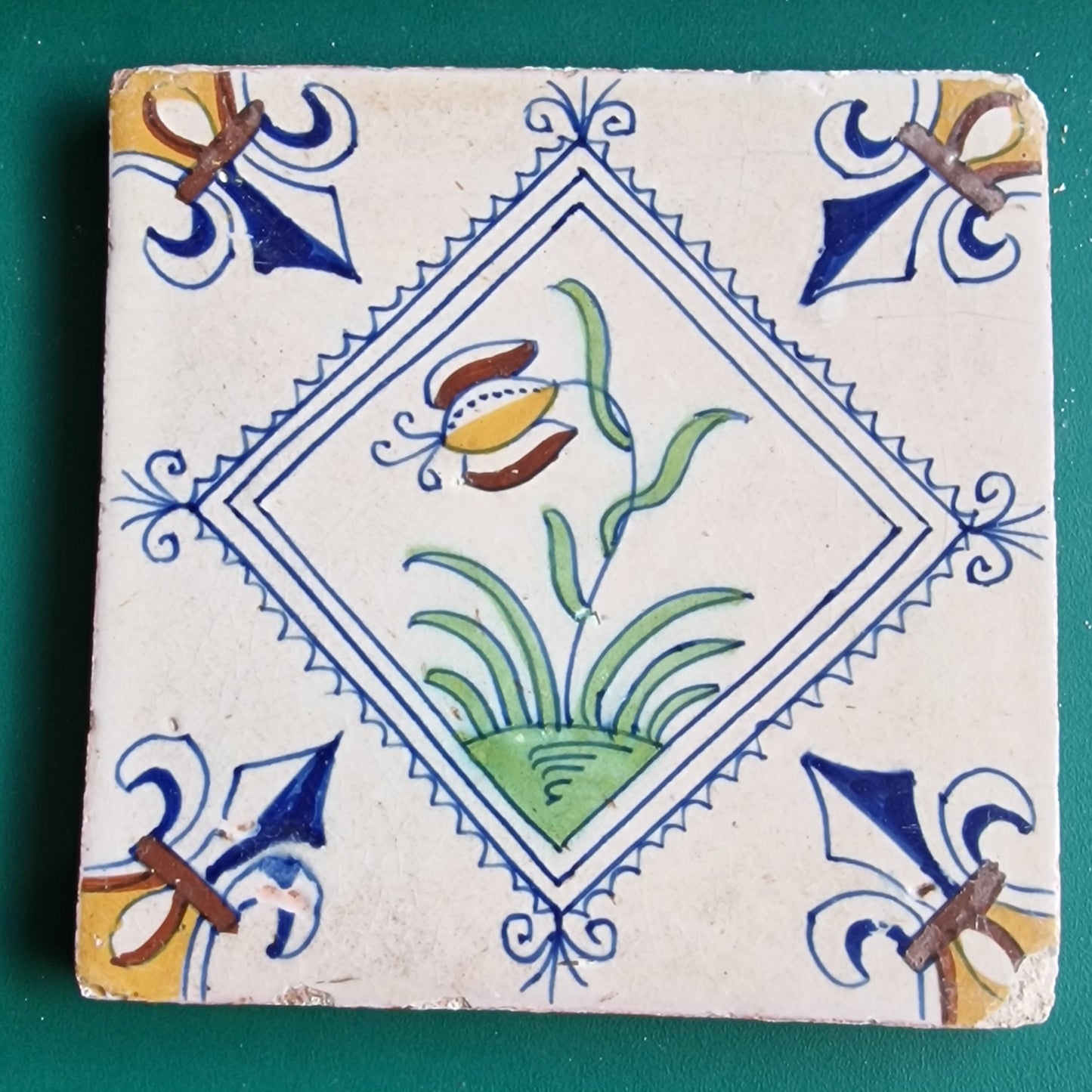 Rare Delft Tile, 17th Century Dutch Polychrome Flower Stamp (13x13 cm)