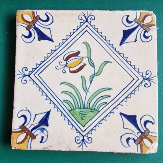 Rare Delft Tile, 17th Century Dutch Polychrome Flower Stamp (13x13 cm)