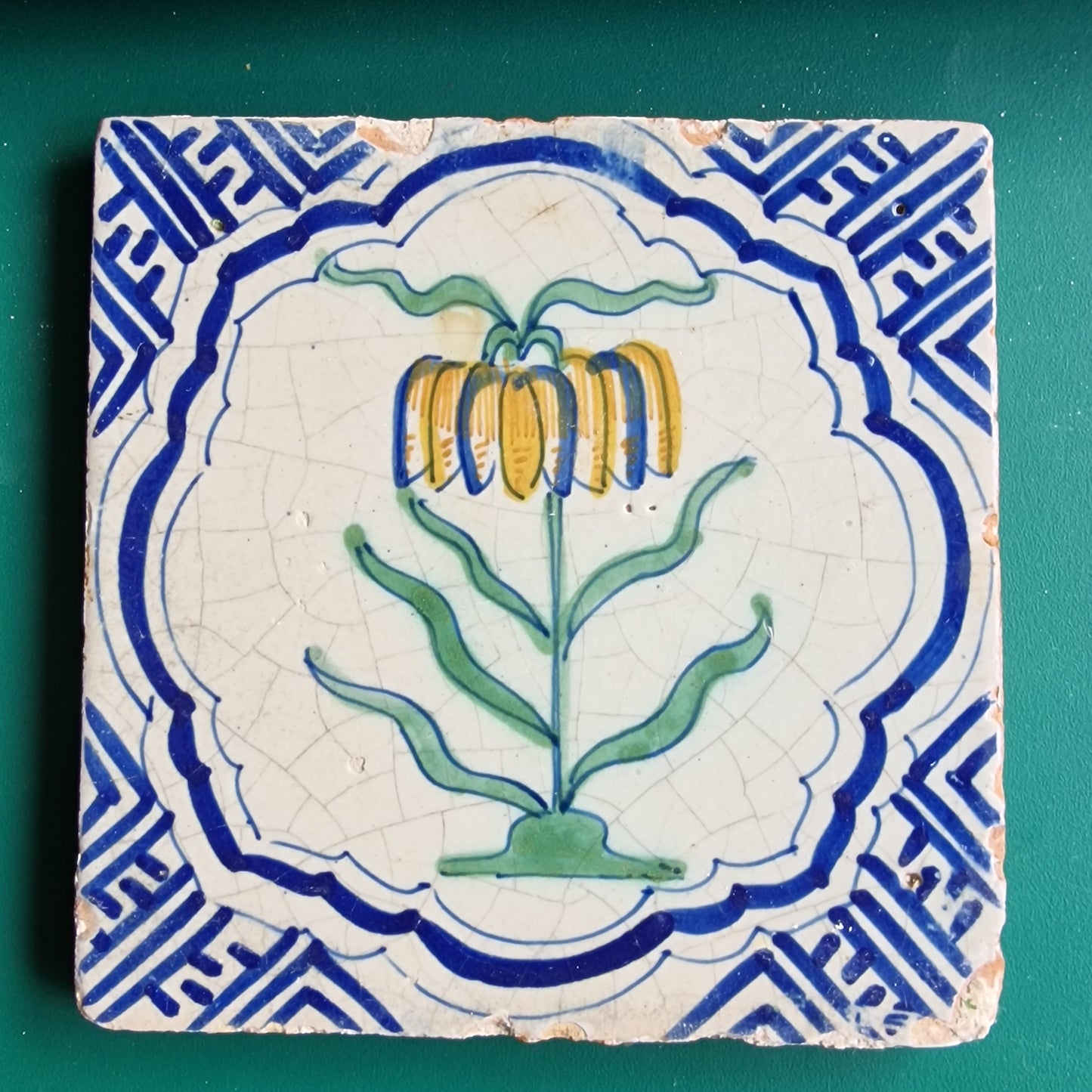 Antique Dutch Delft Tile – Imperial Crown Flower, 17th Century