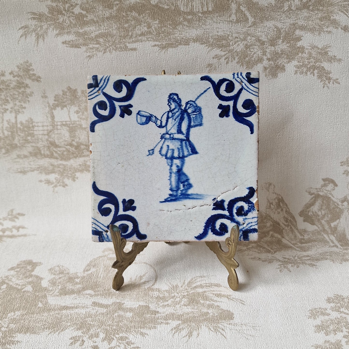 Antique Delft Tile – 17th Century Dutch Soldier, Oxhead Corner