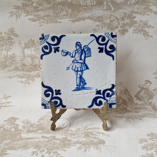 Antique Delft Tile – 17th Century Dutch Soldier, Oxhead Corner