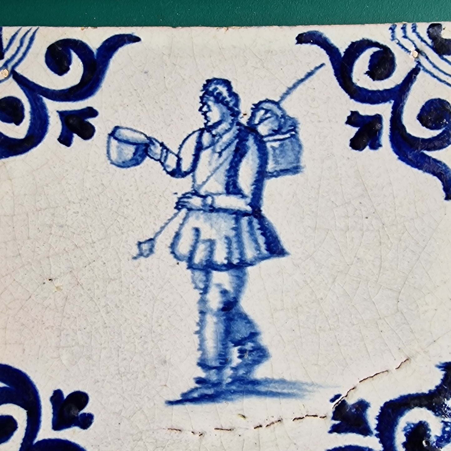 Antique Delft Tile – 17th Century Dutch Soldier, Oxhead Corner