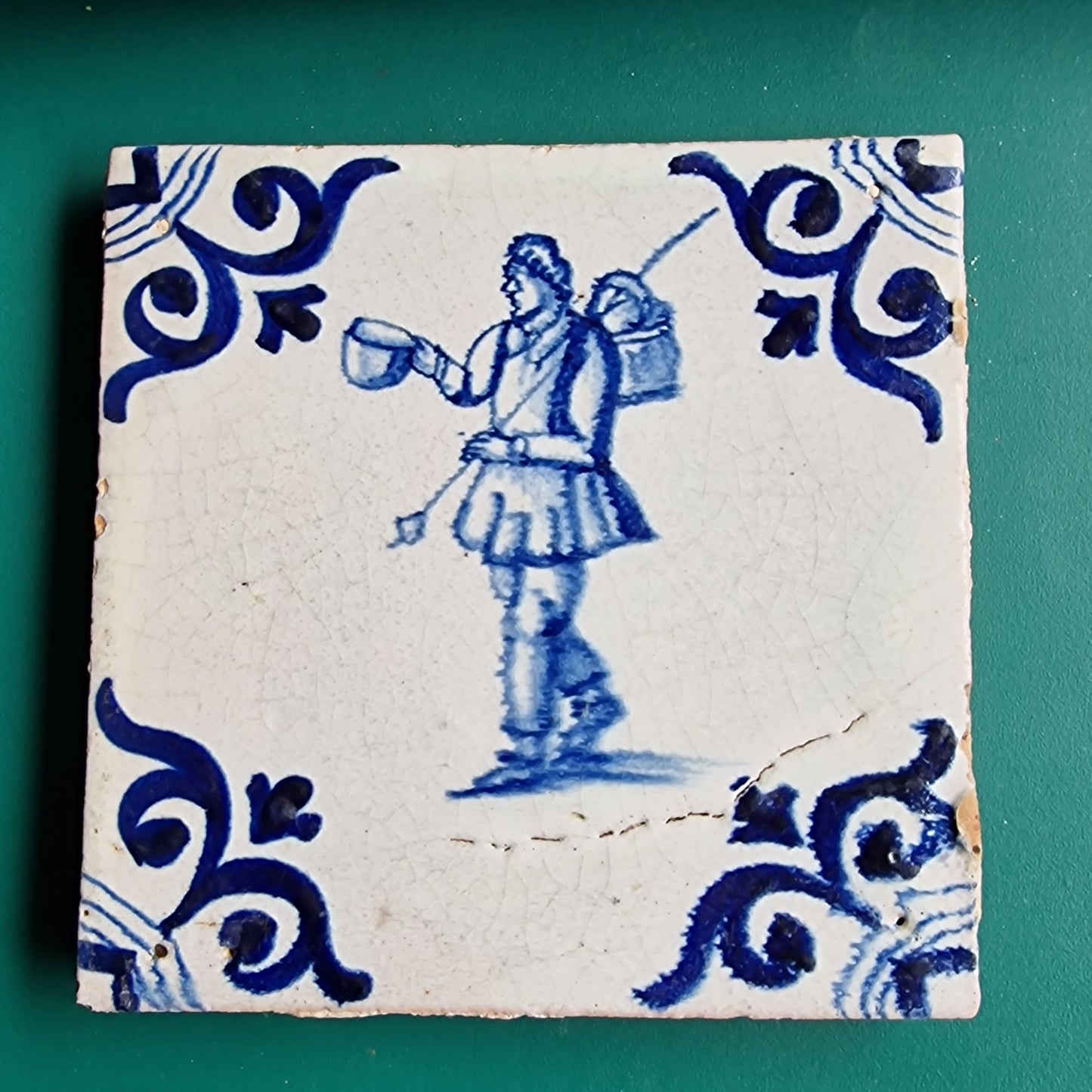 Antique Delft Tile – 17th Century Dutch Soldier, Oxhead Corner