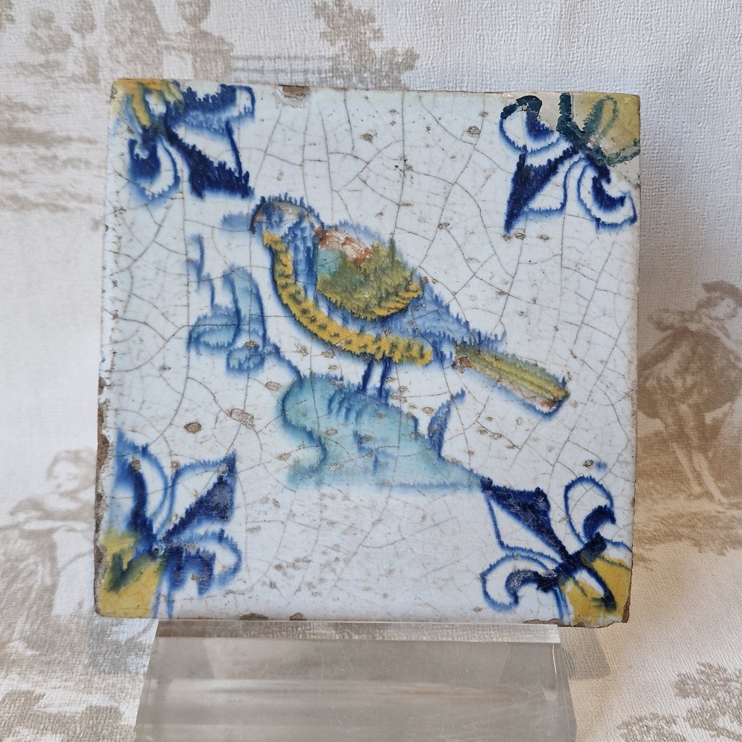 Antique Dutch Delft Tile – Polychrome Bird, Lily Motifs (c. 1630)