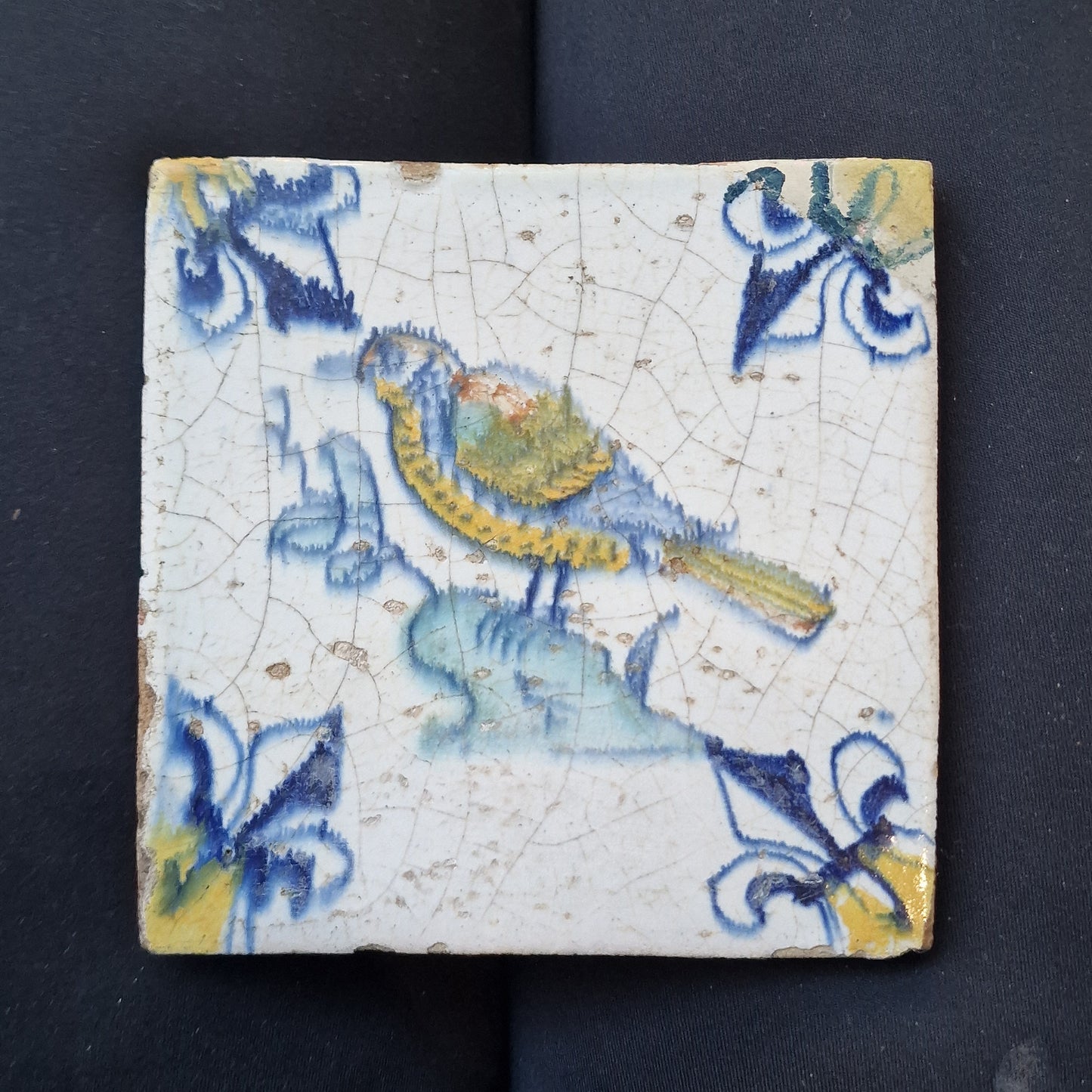 Antique Dutch Delft Tile – Polychrome Bird, Lily Motifs (c. 1630)