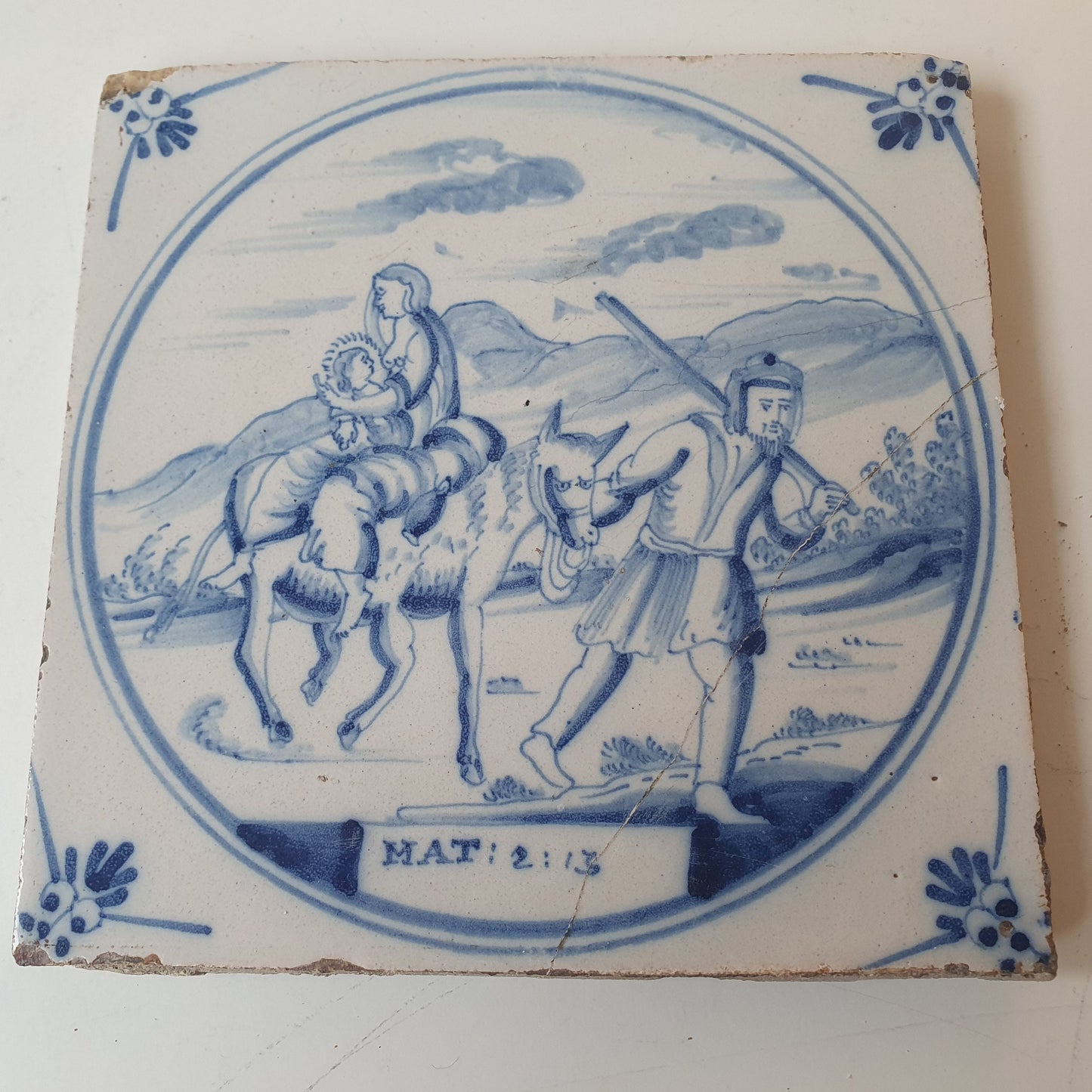 Antique Delft Blue Tile, Biblical Scene, Oxhead Corner Motif, 1840