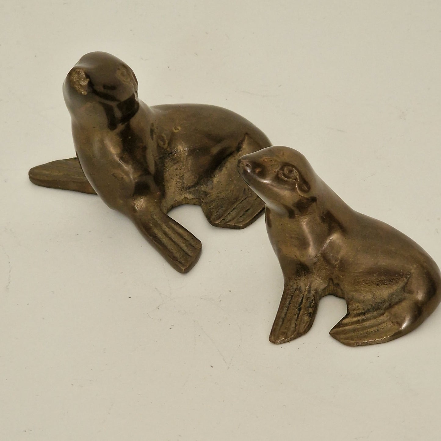 Pair of Vintage Bronze Seal Figurines
