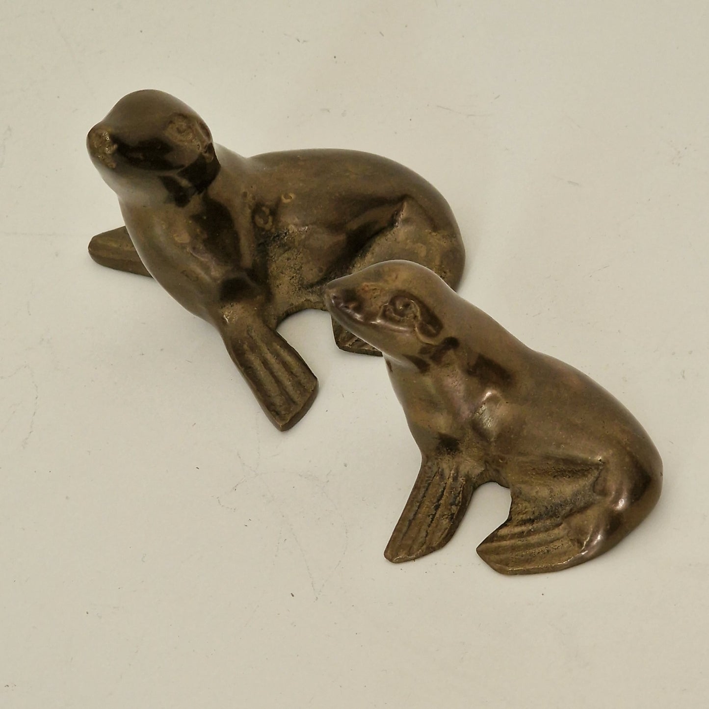 Pair of Vintage Bronze Seal Figurines