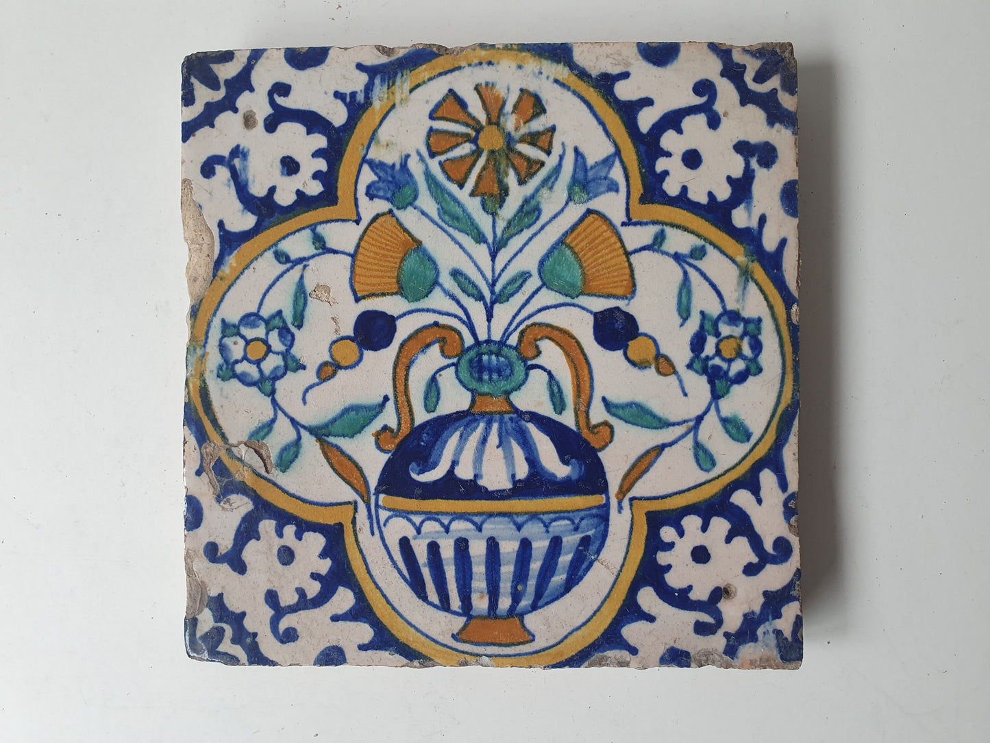Antique Dutch Delft Tile – 17th Century Polychrome Floral Ornament