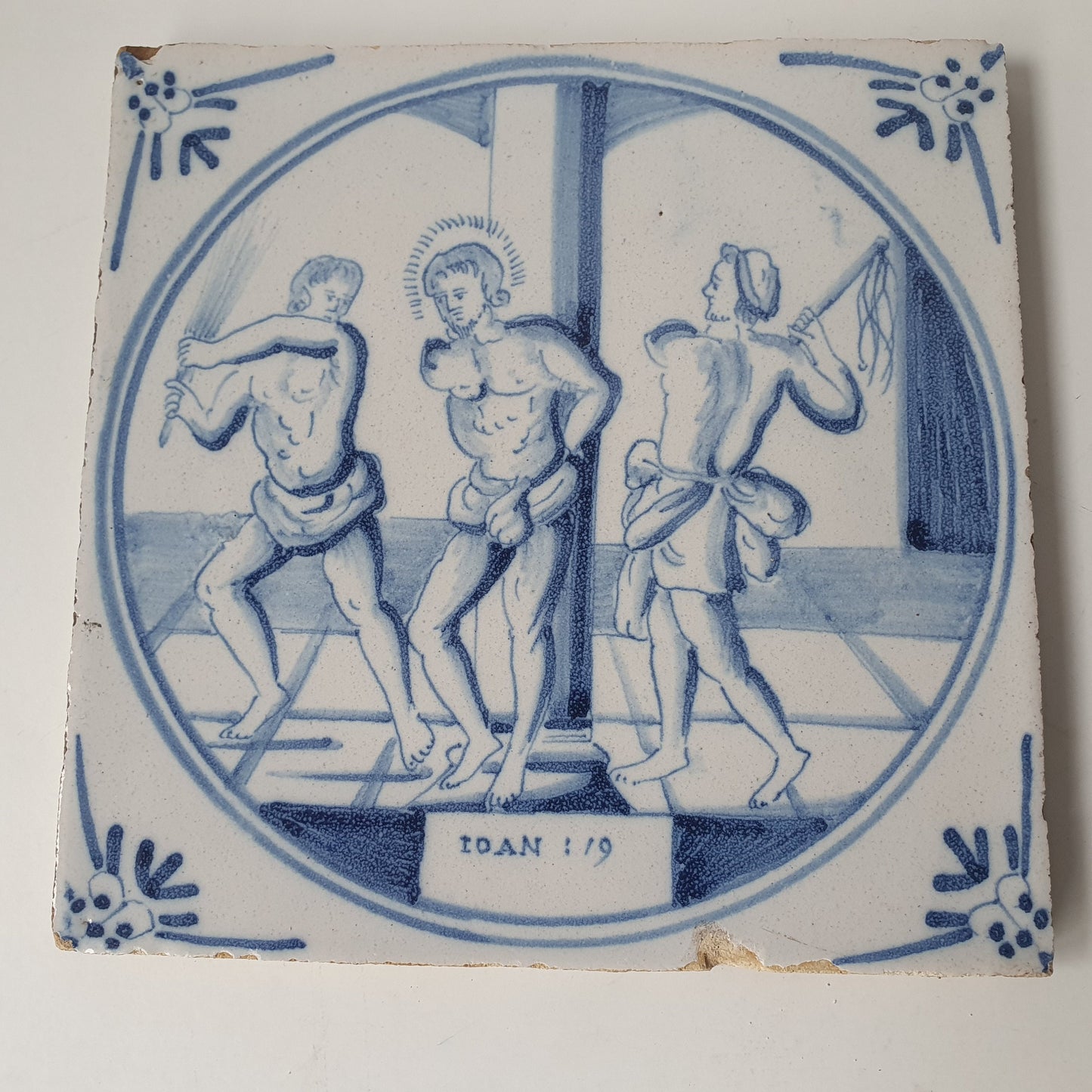 Antique Delft Blue Tile, Biblical Scene, Oxhead Corner Motif, 1840