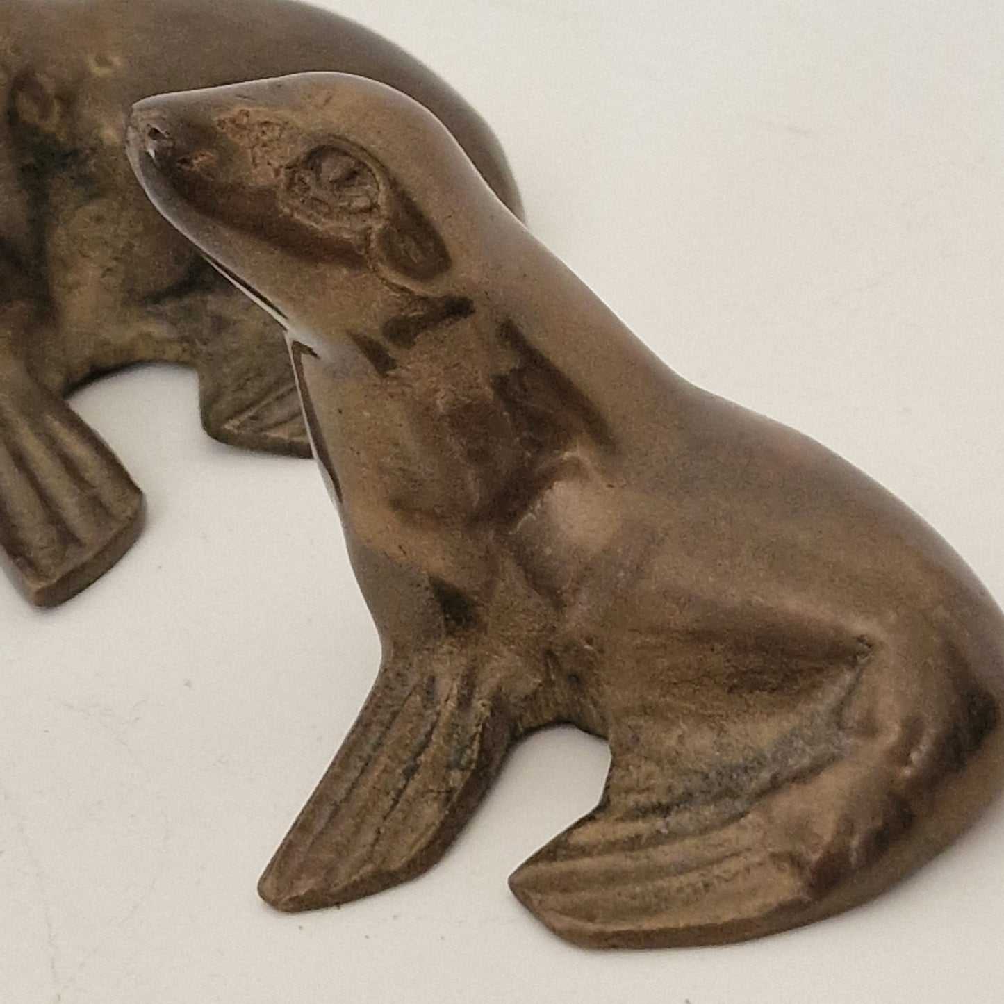 Pair of Vintage Bronze Seal Figurines