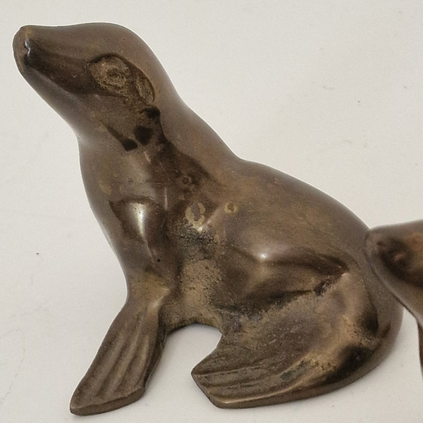 Pair of Vintage Bronze Seal Figurines