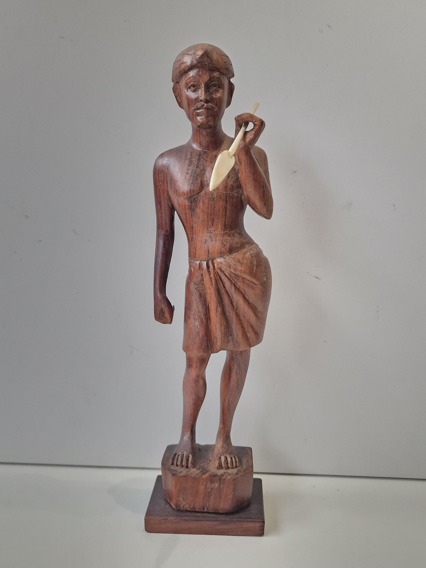 Indonesia, Tropical Indonesian hardwood sculpture, 1930's. Man, spear hunter 31 cm