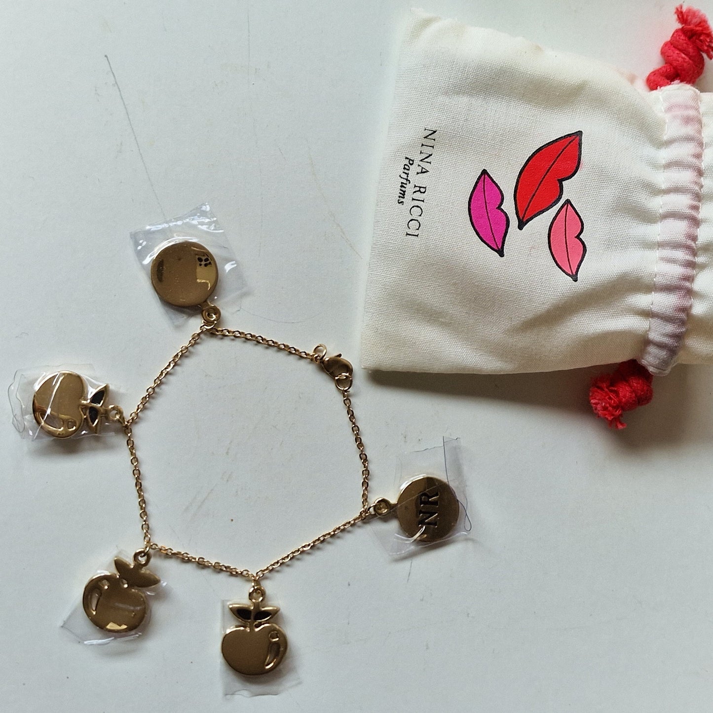 Vintage NINA RICCI Gold Plated Apple Charm Bracelet, Unused
