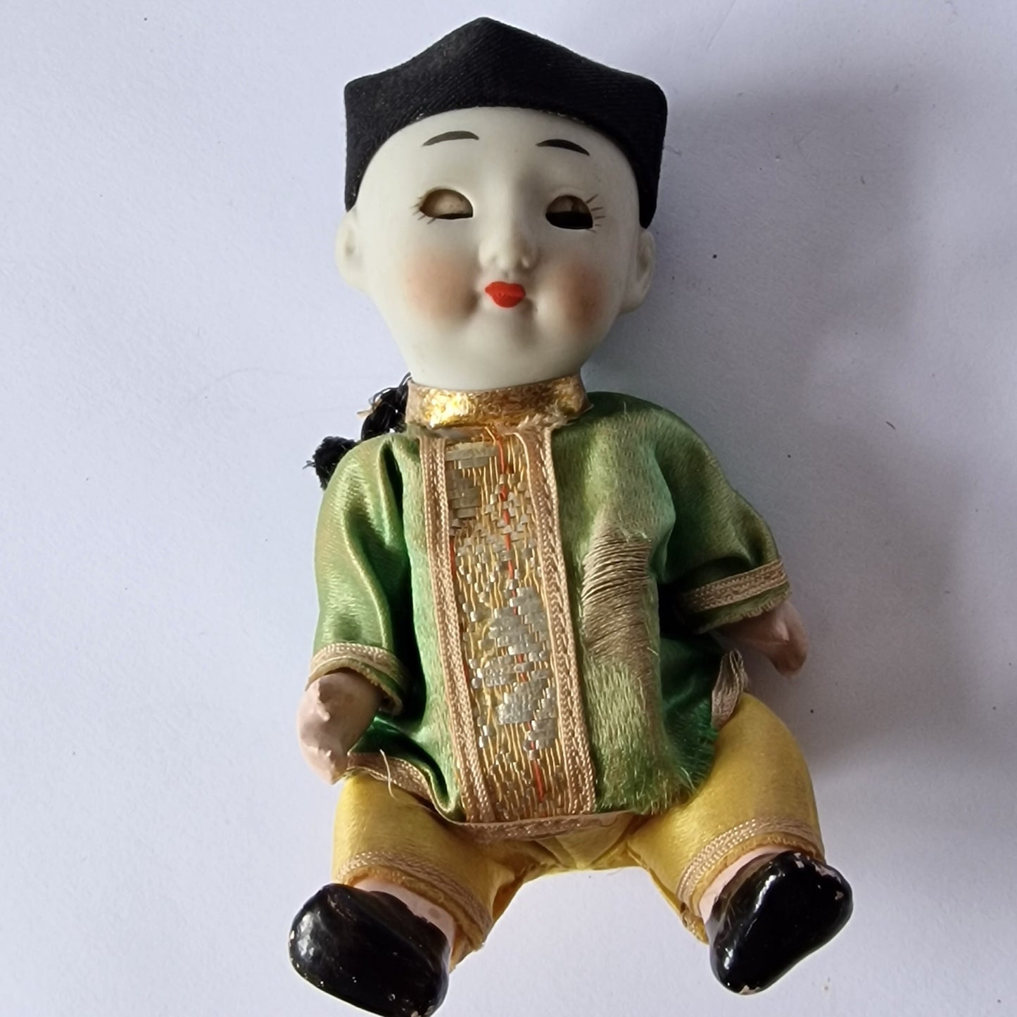 Japanese boy doll, glass eyes, Bisque porcelain, squeeze belly, midcentury figure collector display collectable.