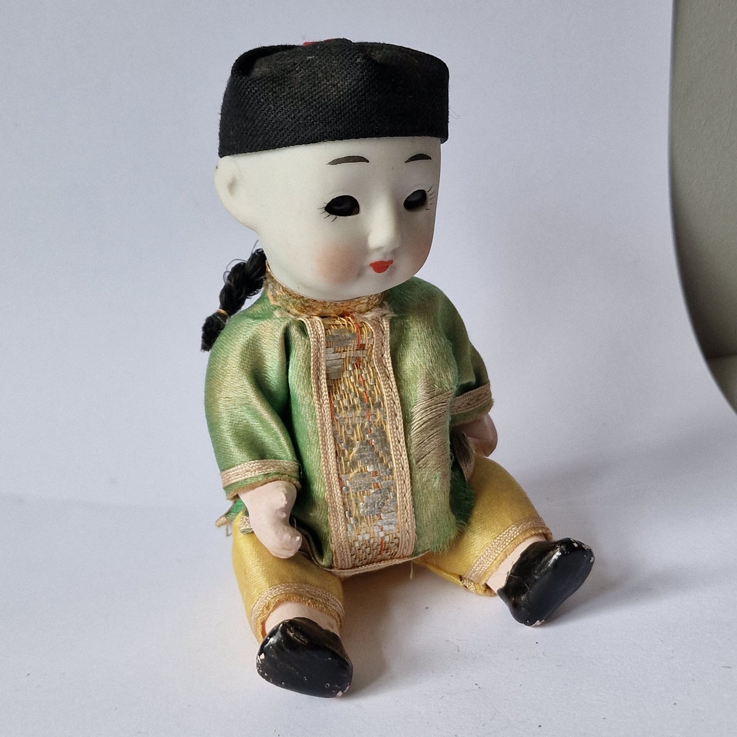 Japanese boy doll, glass eyes, Bisque porcelain, squeeze belly, midcentury figure collector display collectable.