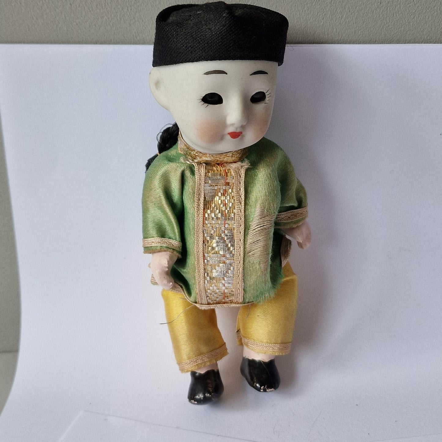 Japanese boy doll, glass eyes, Bisque porcelain, squeeze belly, midcentury figure collector display collectable.