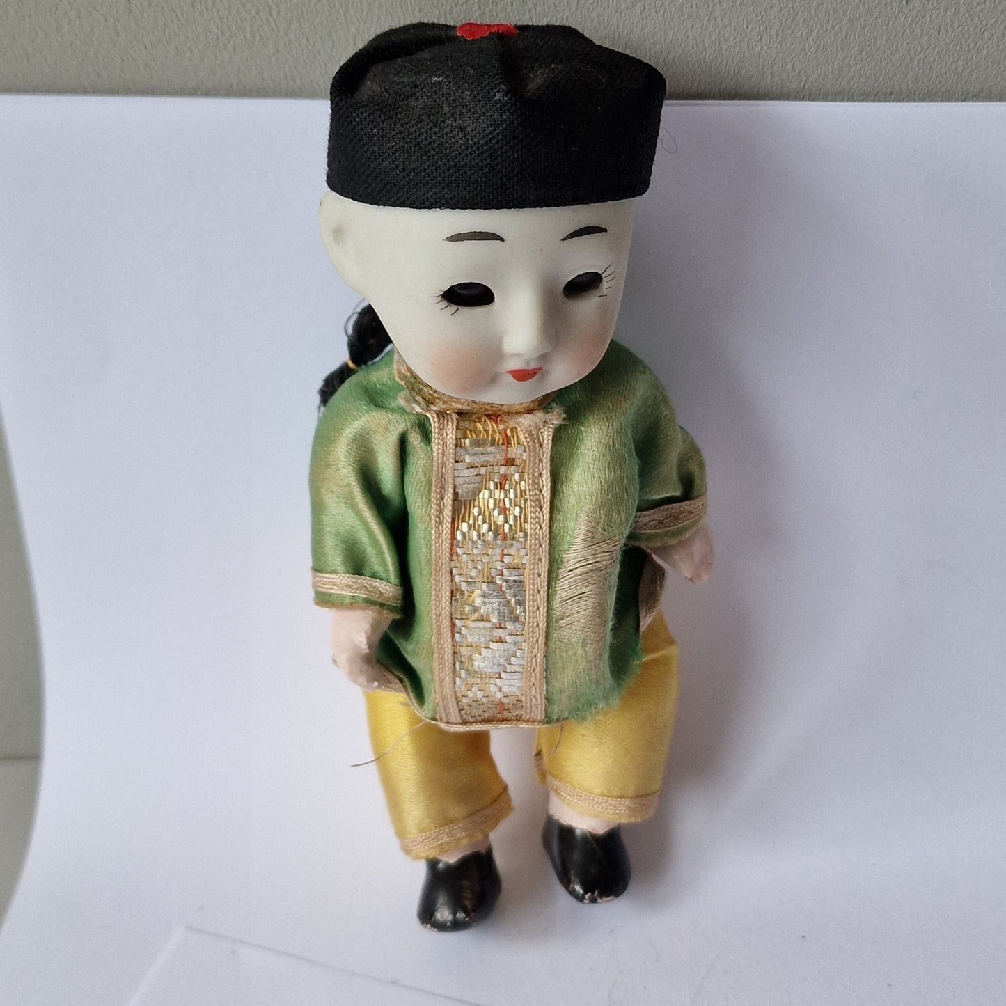 Japanese boy doll, glass eyes, Bisque porcelain, squeeze belly, midcentury figure collector display collectable.