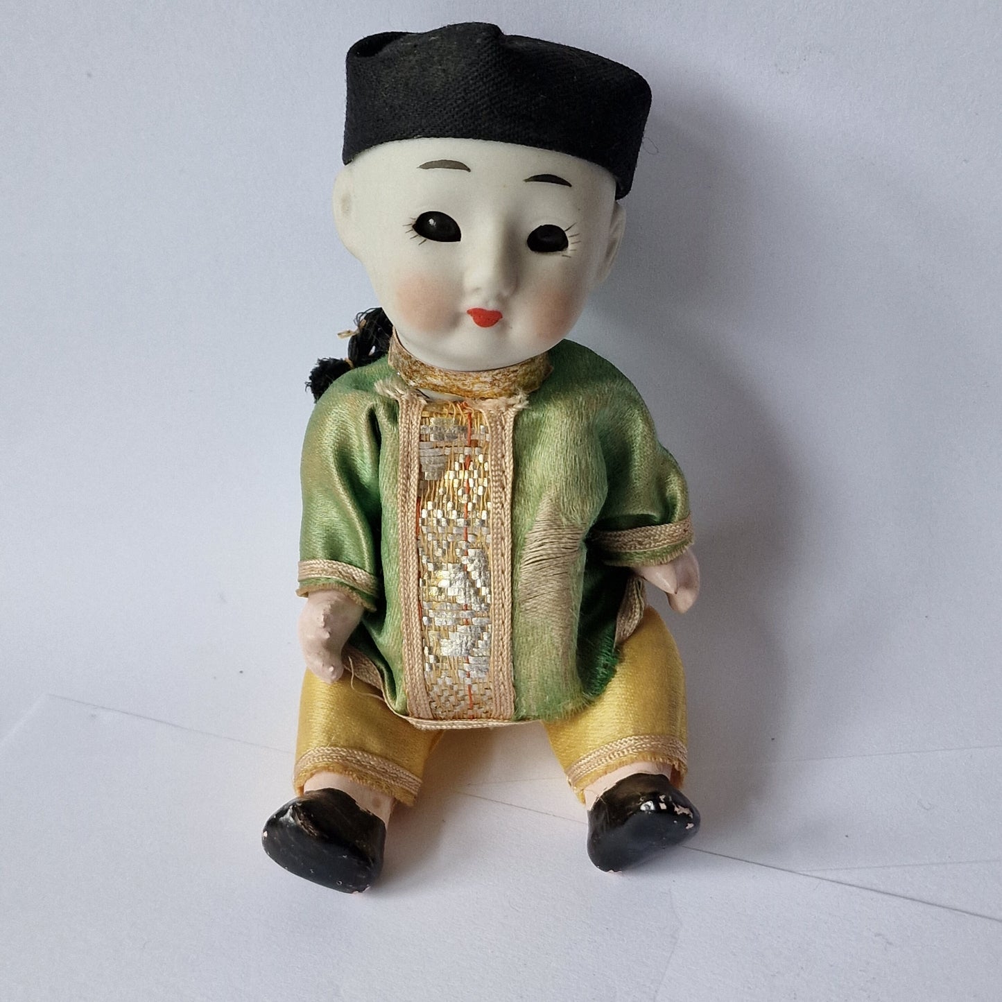 Japanese boy doll, glass eyes, Bisque porcelain, squeeze belly, midcentury figure collector display collectable.