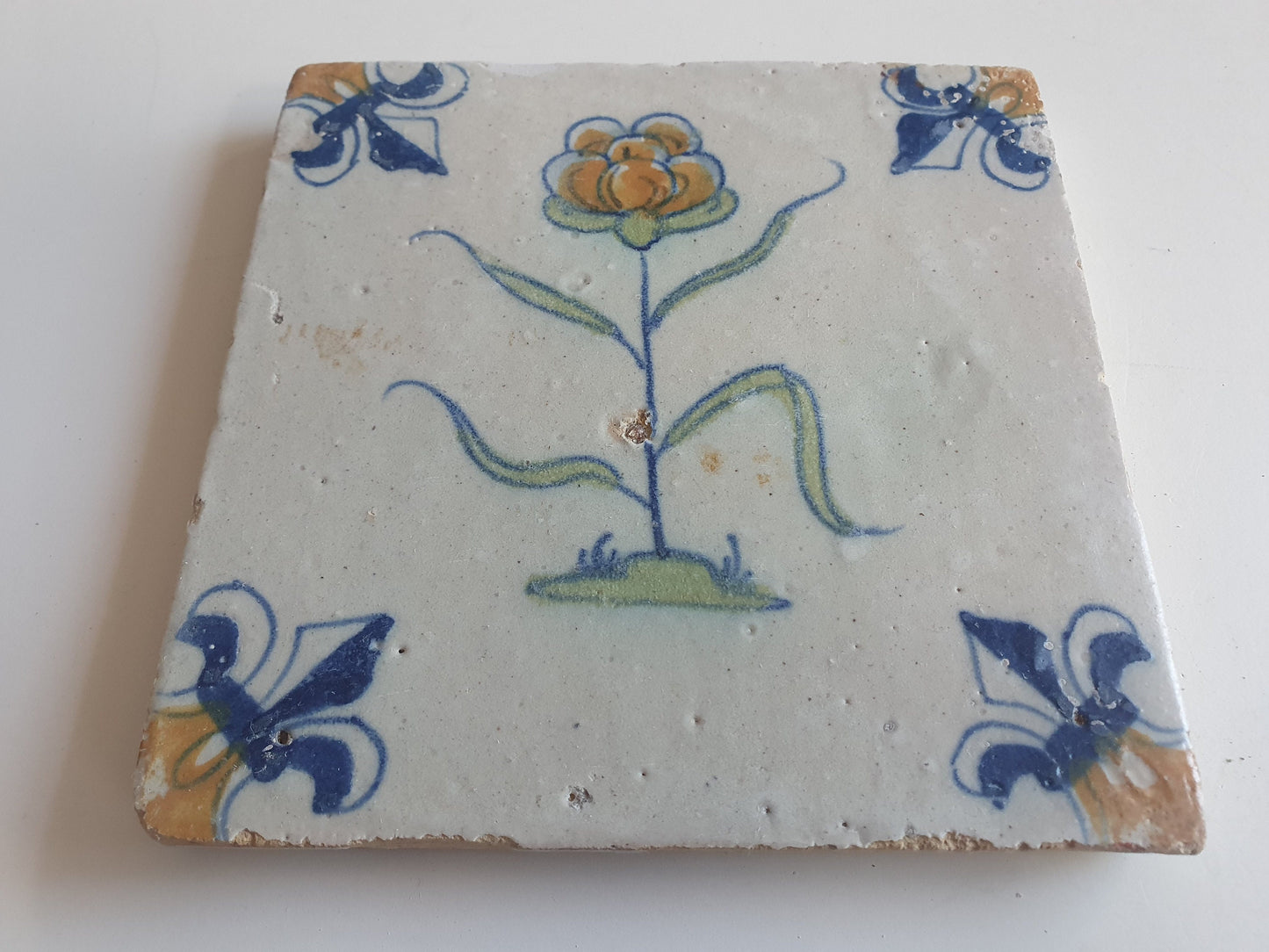 Antique Delft Tile – Polychrome Flower, Fleur-de-Lis Motifs (1640)