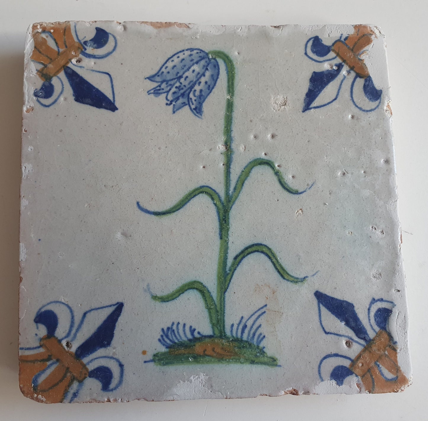 Antique Delft Tile – Polychrome Lily Flower, Fleur-de-Lis Motifs (circa 1640)