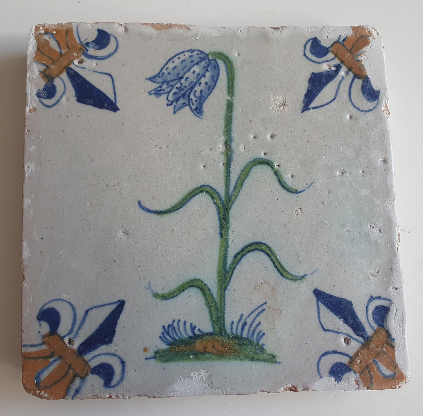 Antique Delft Tile – Polychrome Lily Flower, Fleur-de-Lis Motifs (circa 1640)
