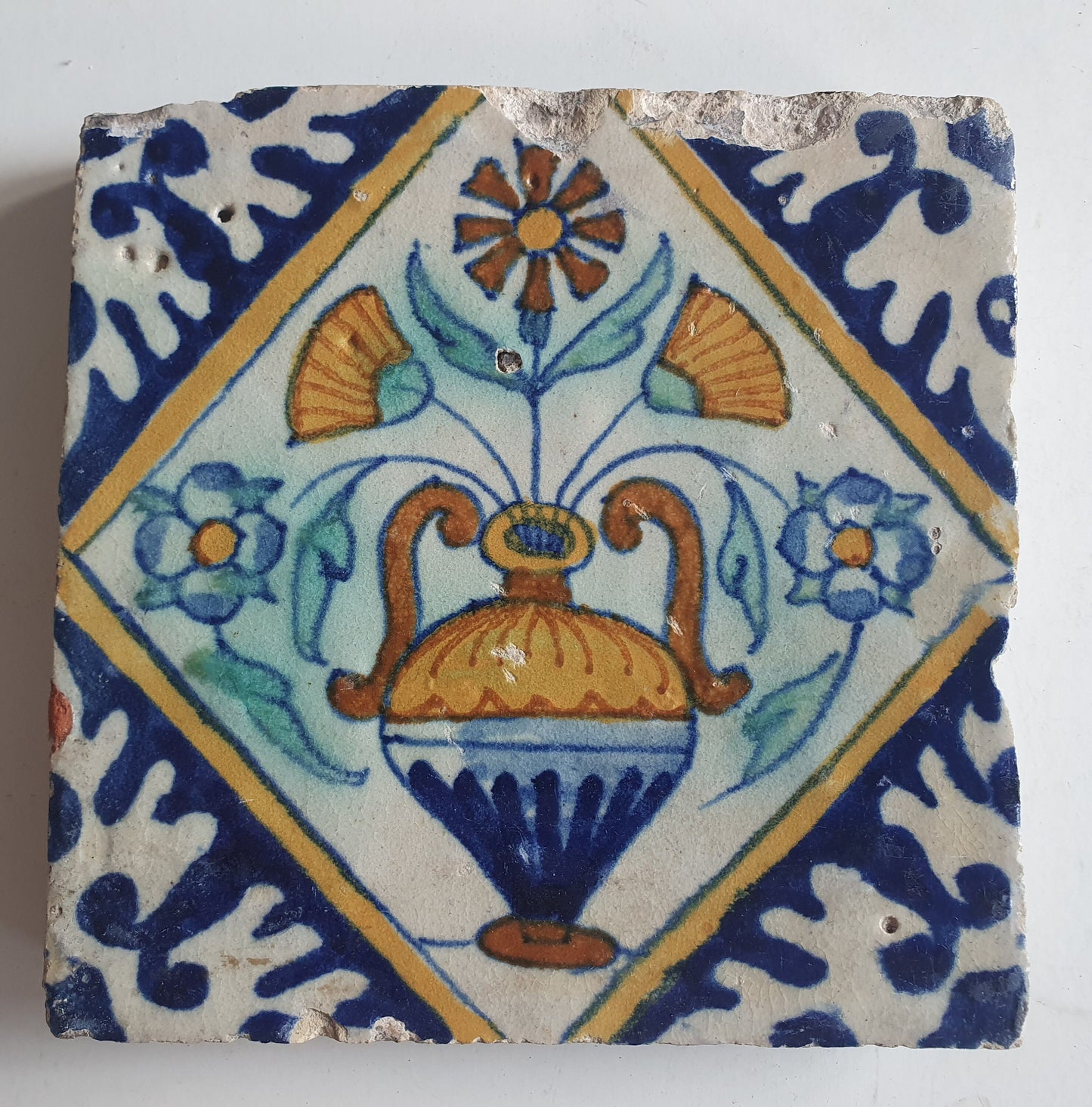 Antique Dutch Tile – 17th Century Polychrome Floral Ornament