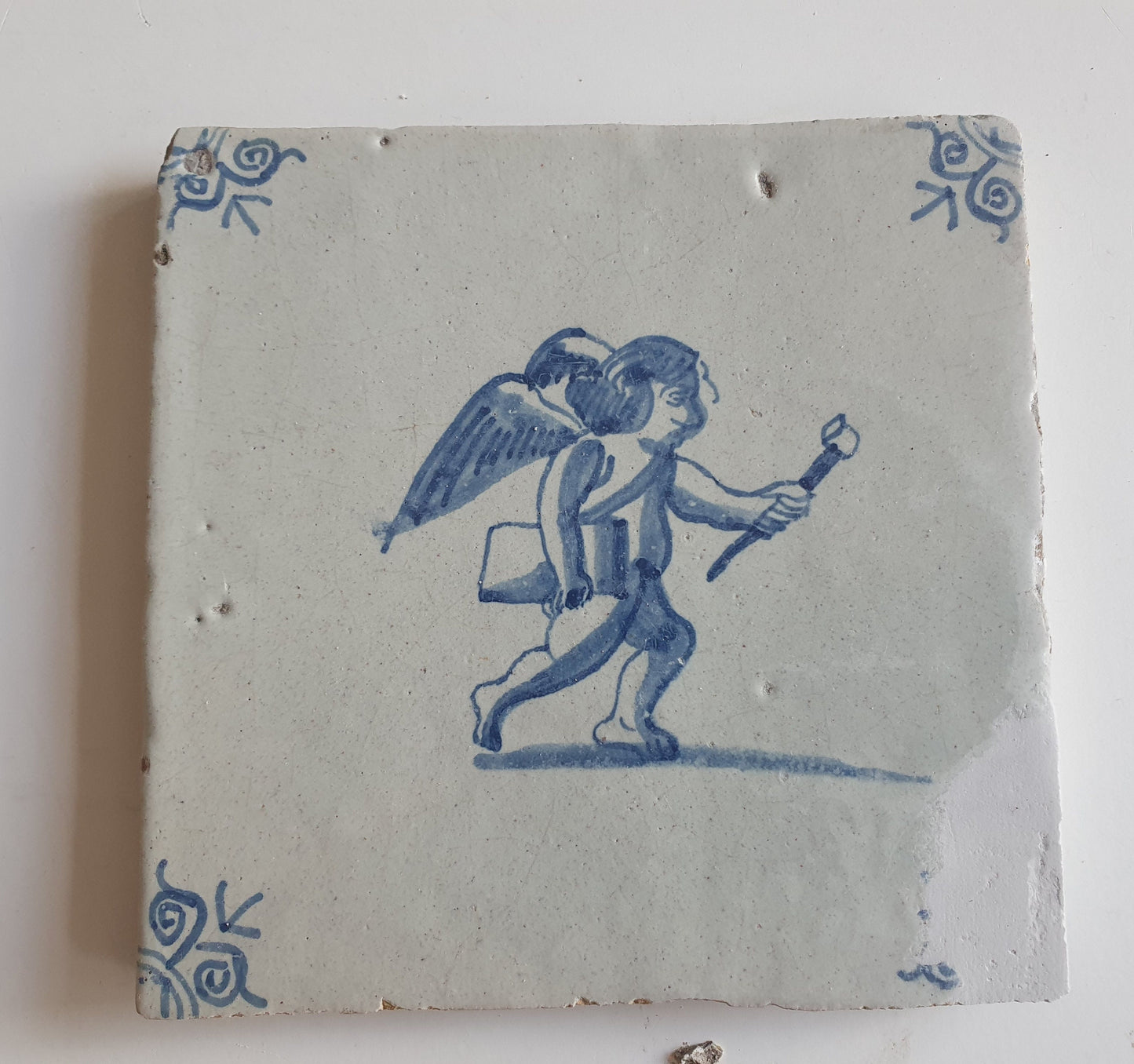 Antique Delft Tile: 17th Century Dutch Oxhead, Mythological Angel