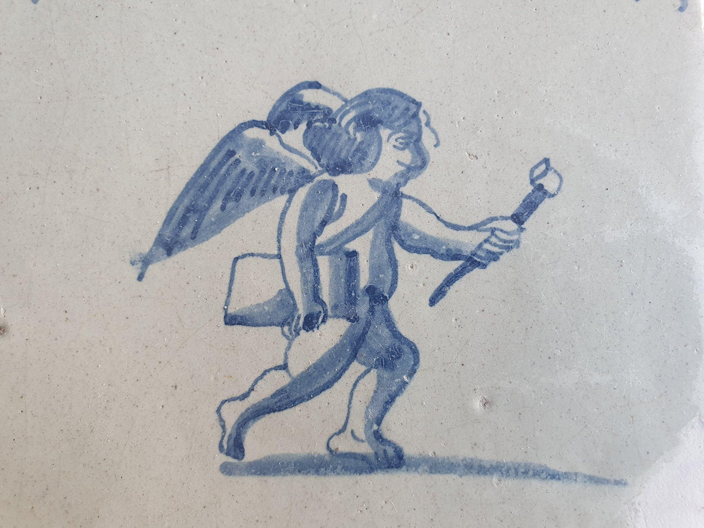 Antique Delft Tile: 17th Century Dutch Oxhead, Mythological Angel