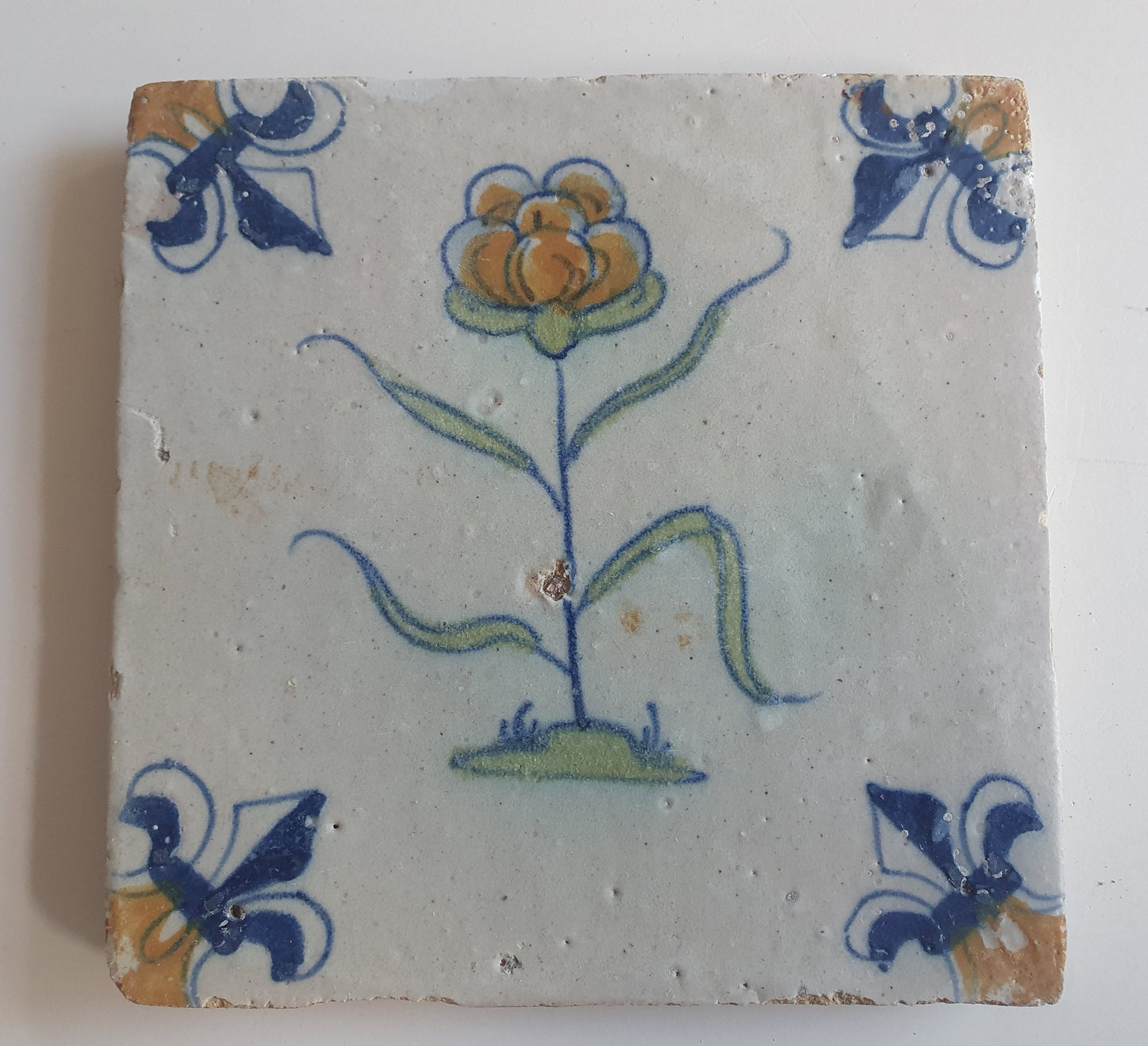 Antique Delft Tile – Polychrome Flower, Fleur-de-Lis Motifs (1640)