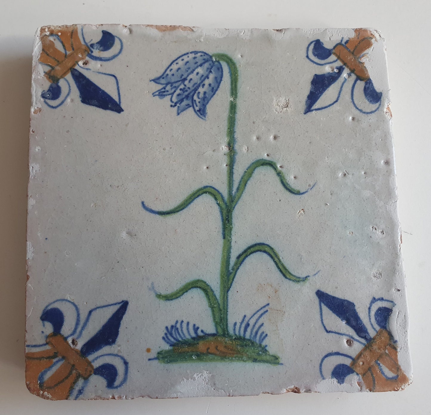 Antique Delft Tile – Polychrome Lily Flower, Fleur-de-Lis Motifs (circa 1640)