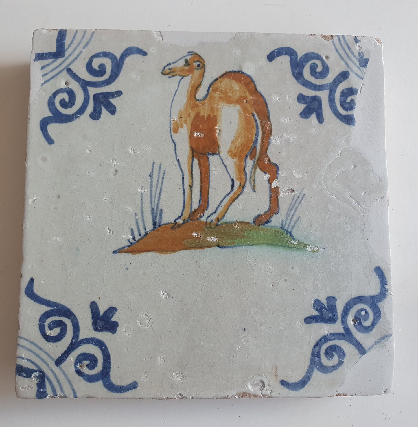 Antique Delft Tile – 17th Century Dromedary, Oxhead Corner Motifs