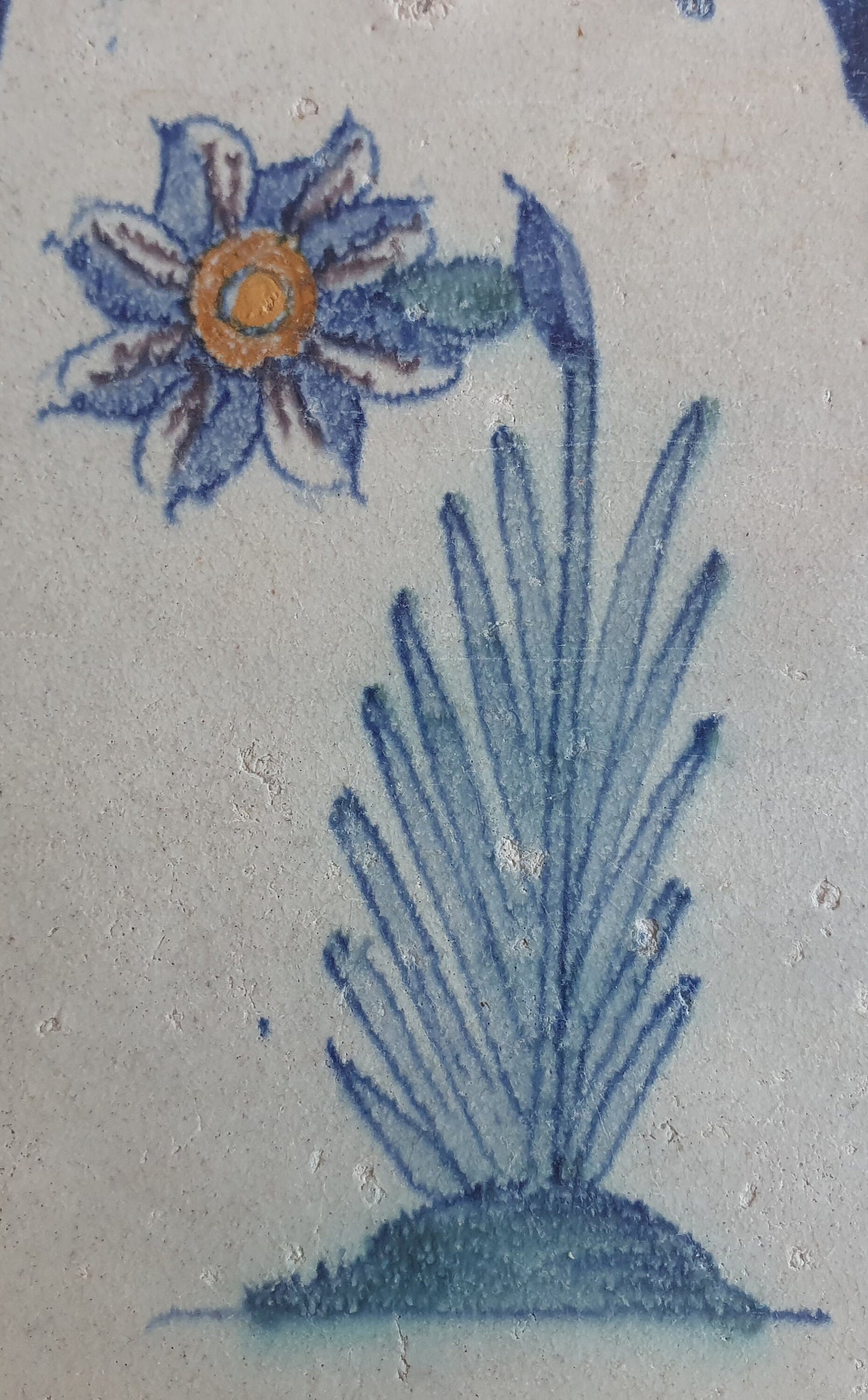 Antique Delft Tile – Polychrome Flower, Oxhead Motifs (circa 1640)