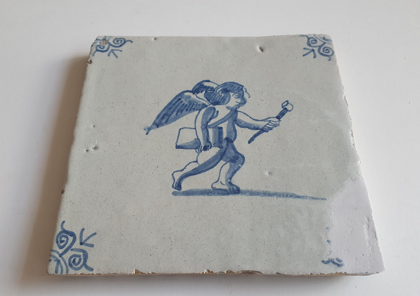 Antique Delft Tile: 17th Century Dutch Oxhead, Mythological Angel