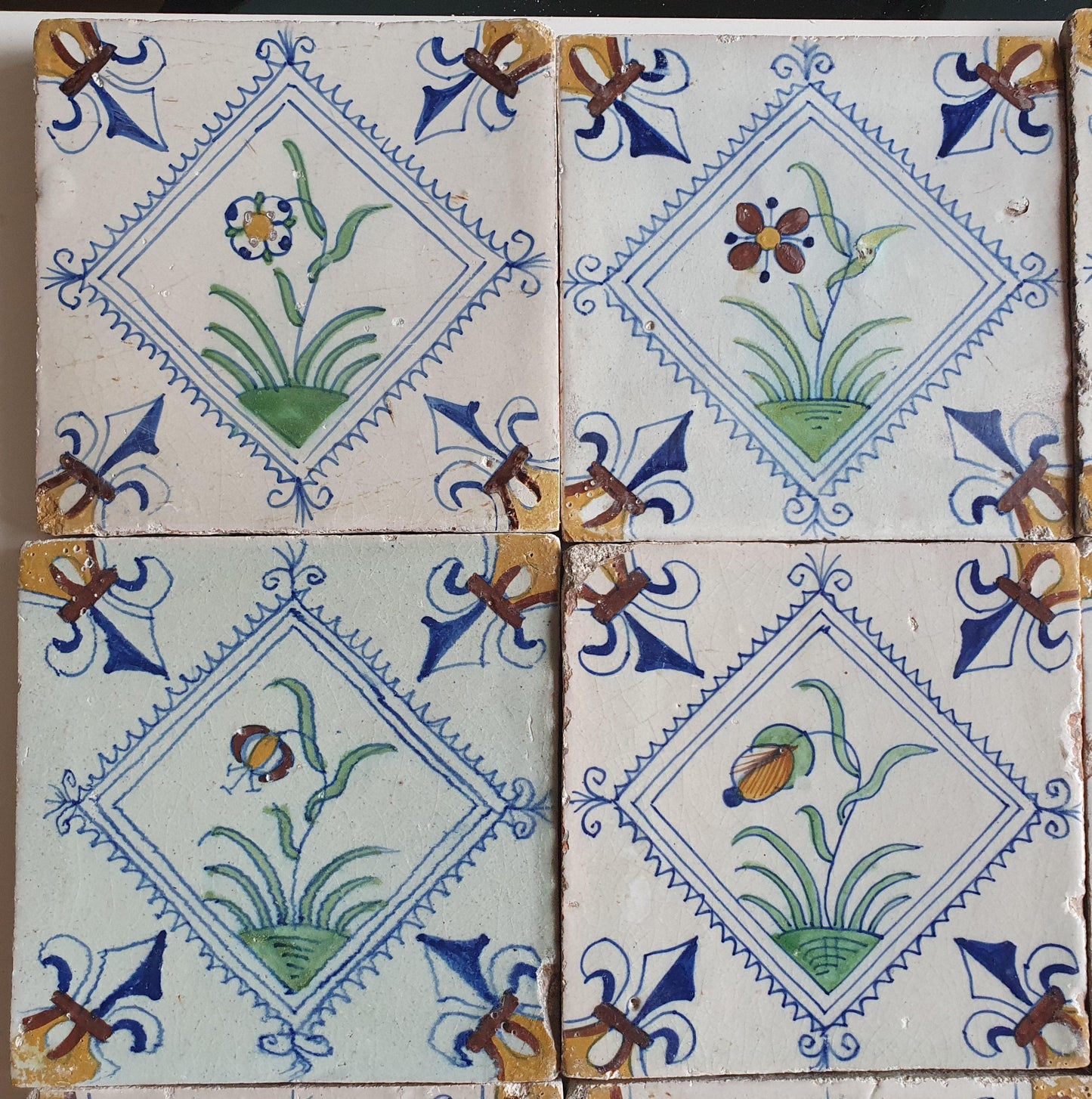 17th Century Delft Tiles | Antique Dutch Tilefield, Floral Motifs (16pc)