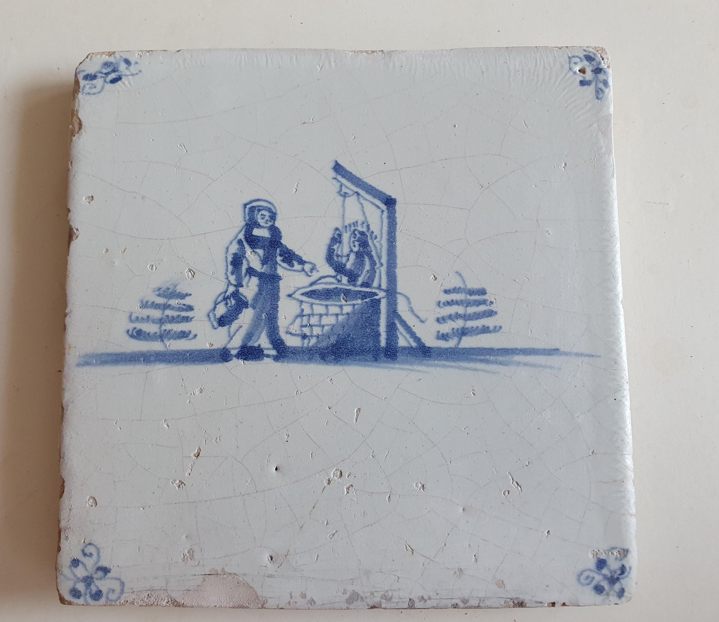 Antieke tegel met Bijbelse voorstelling   in spinnekophoek, antique dutch delft blue tile bible 17th