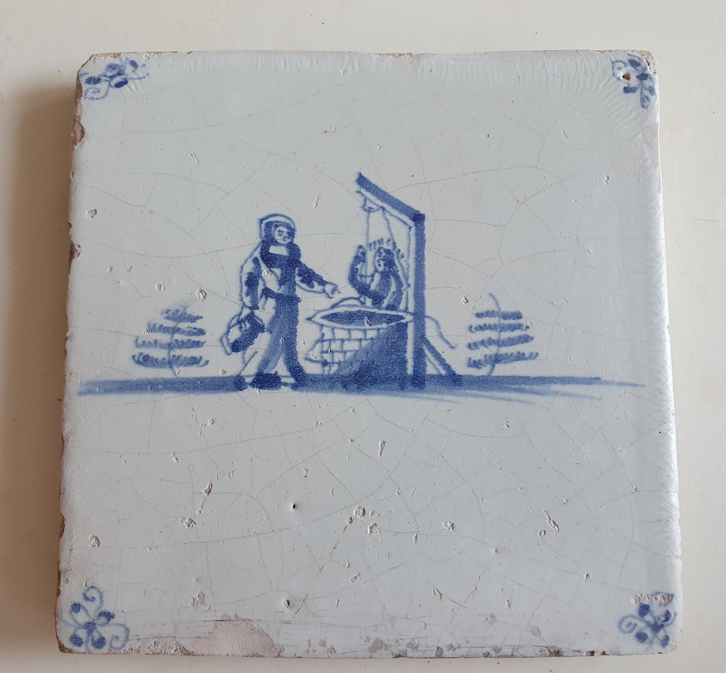 Antieke tegel met Bijbelse voorstelling   in spinnekophoek, antique dutch delft blue tile bible 17th
