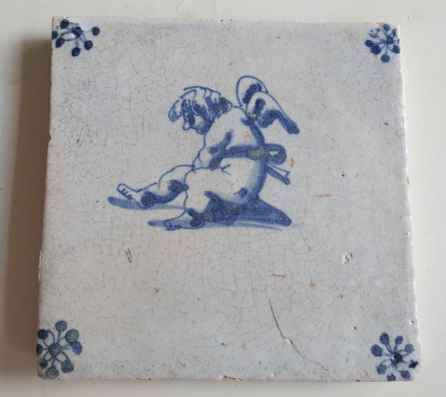 Antique Dutch Tile -  angel   - Dated 1640, spiderhead corner, delft blue , holland 17th century