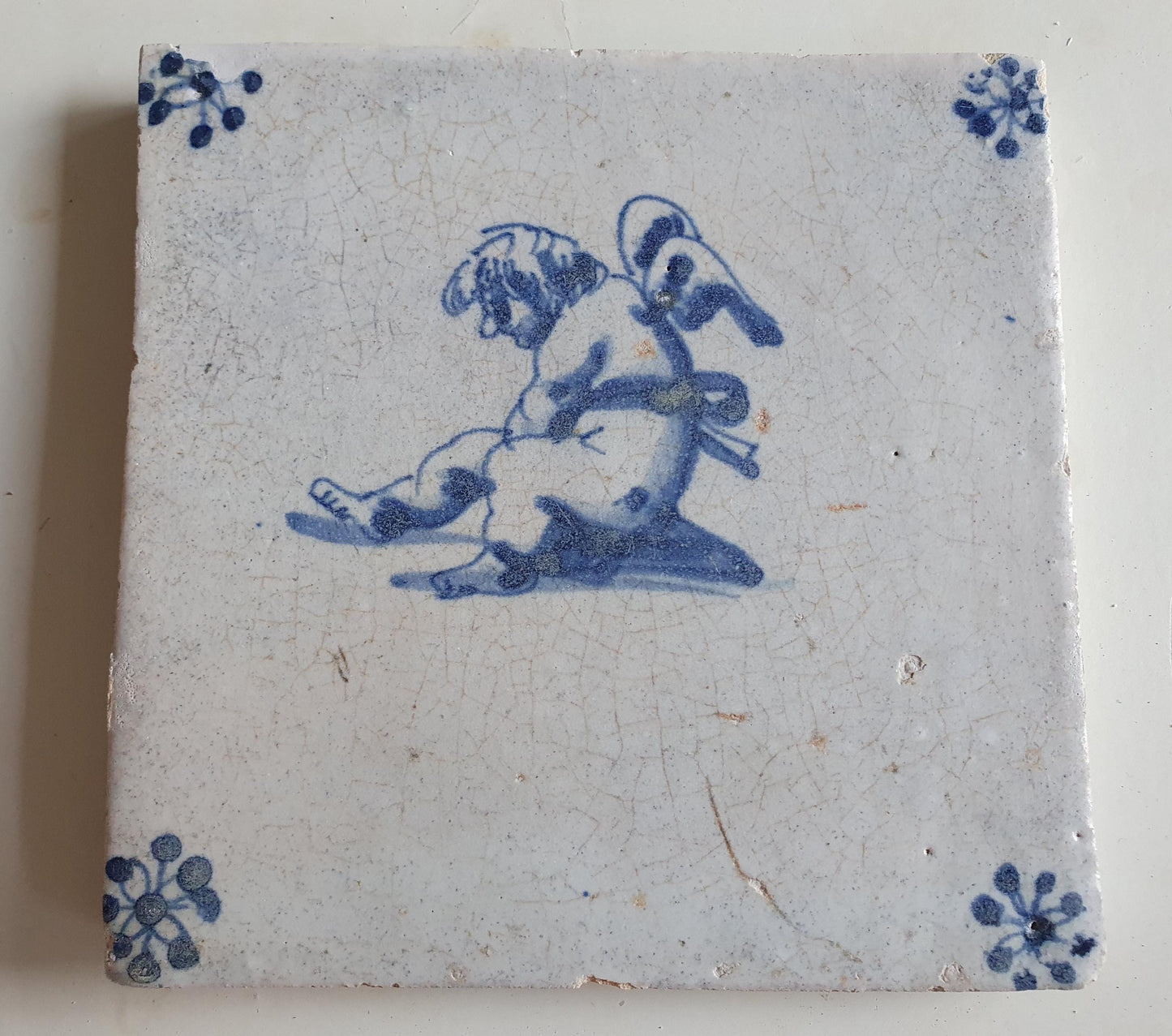 Antique Dutch Tile -  angel   - Dated 1640, spiderhead corner, delft blue , holland 17th century
