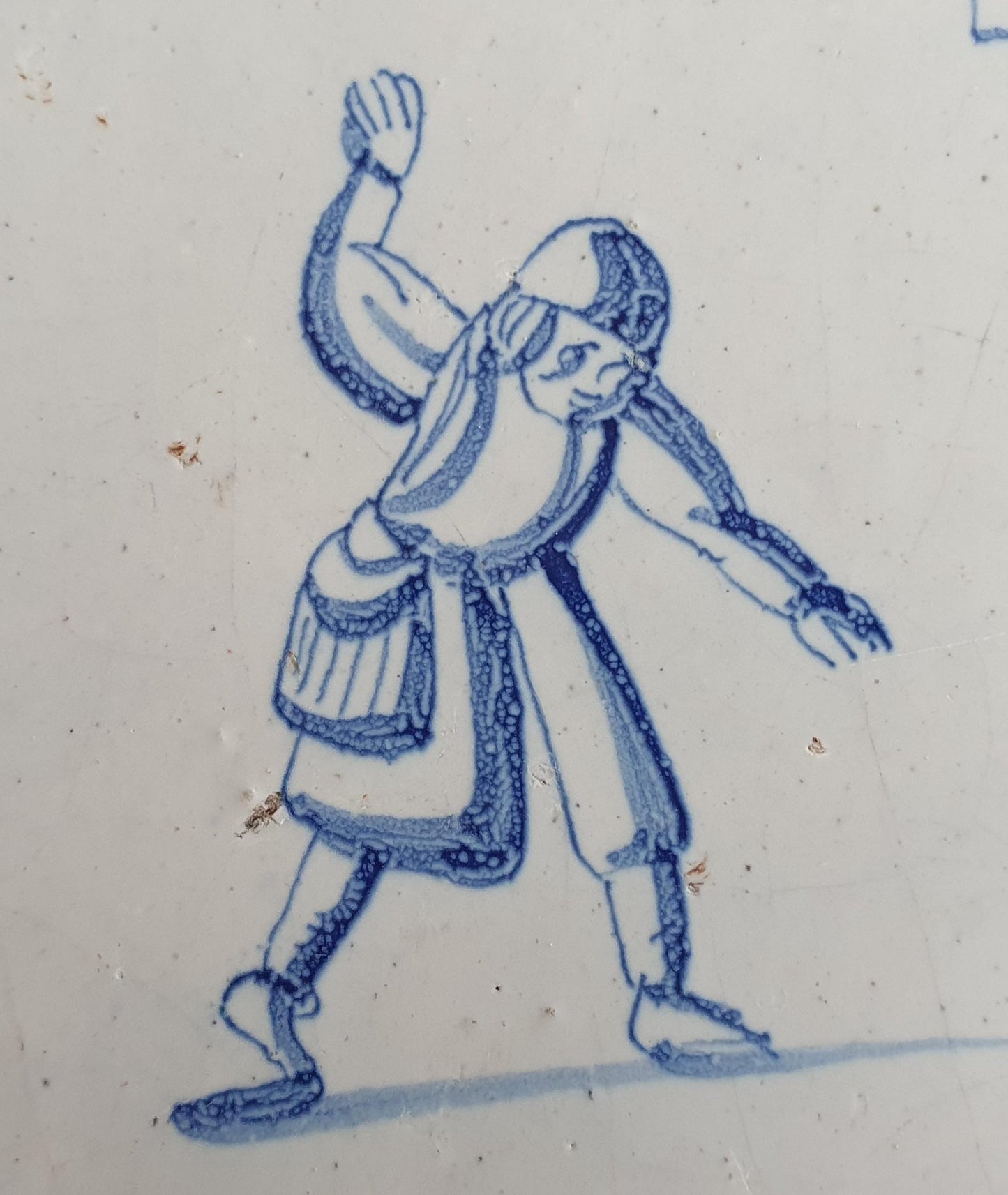 Antique Dutch Delft Blue Tile - representation of a dancer with a meander shape - Dated around 1640
